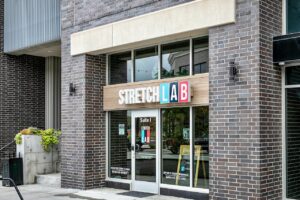 Stretch Lab is located between The City Pub and Heights Draft Room.
